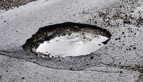 pothole in road